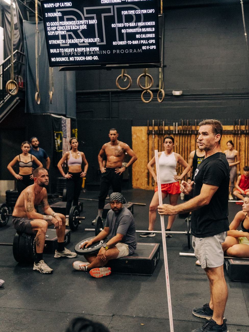 Coach briefing a Ripped Training Program class